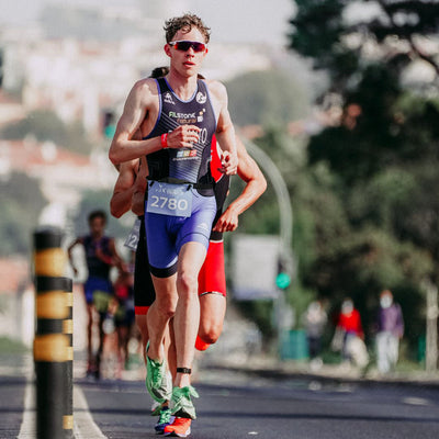 man running with velochampion gel loop belt lifestyle